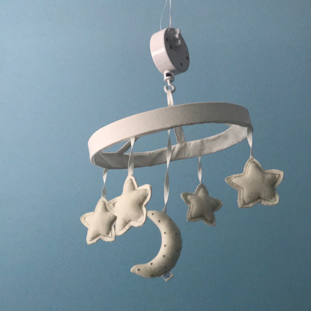 Pottery barn star and moon mobile with music